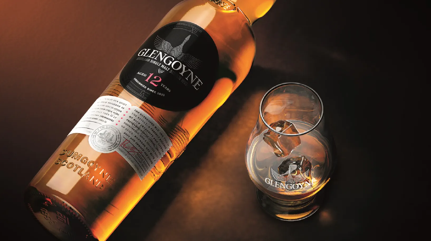 A bottle of 12 year old and a dram next to it